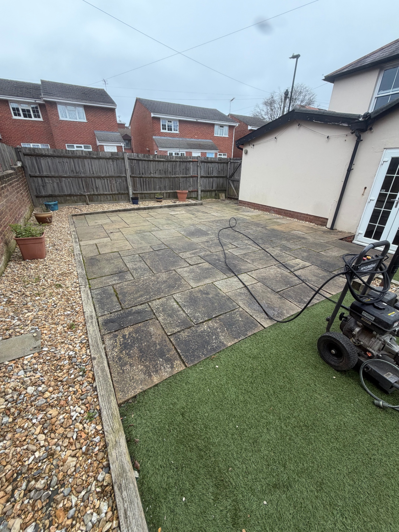 Sandstone patio before cleaning