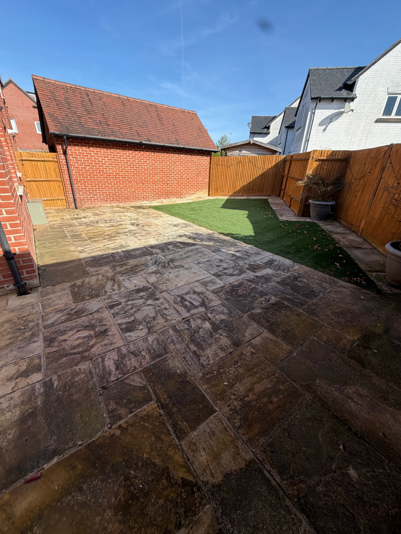 Sandstone patio before cleaning