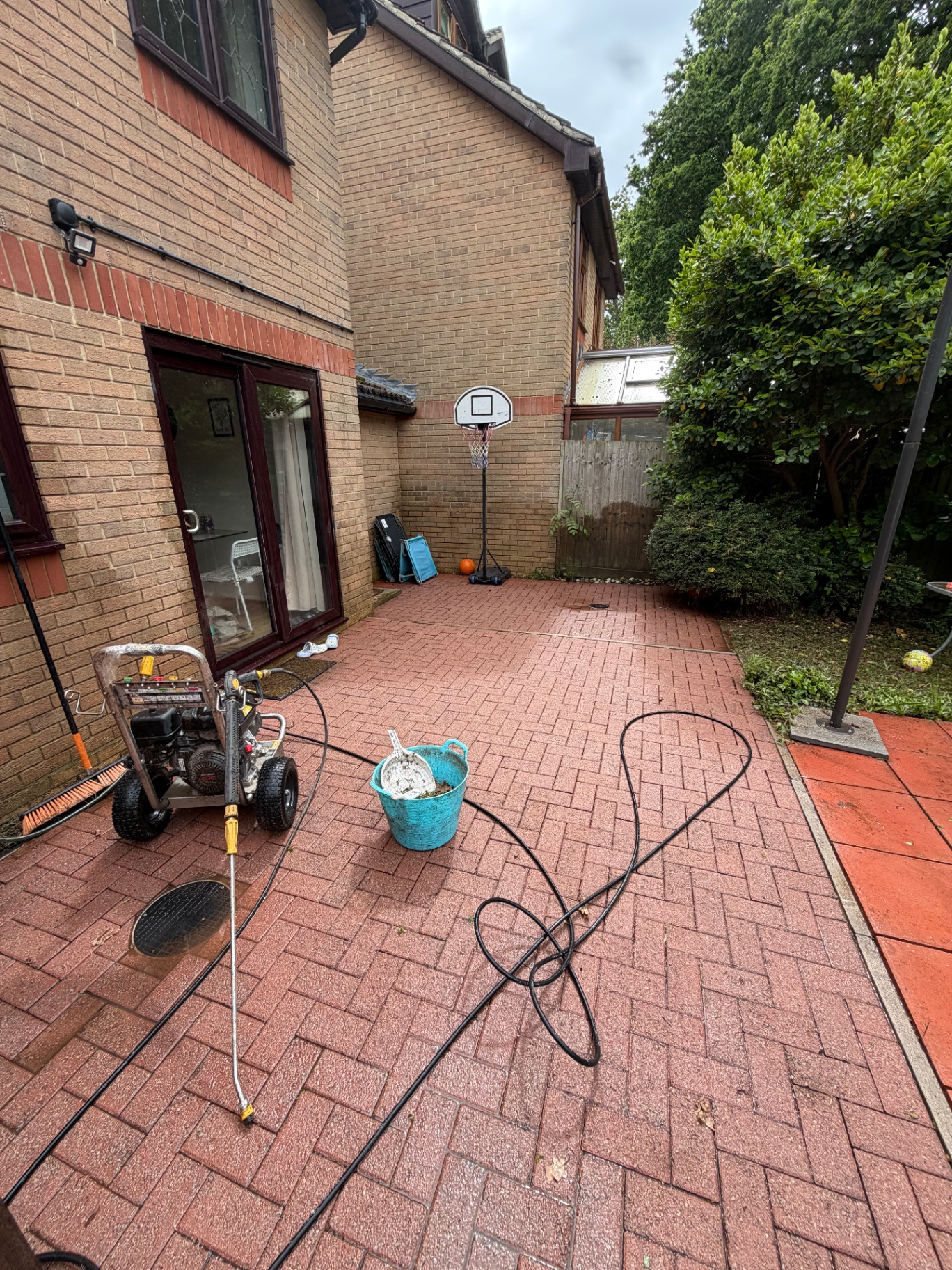 Exterior paving cleaned and rinsed